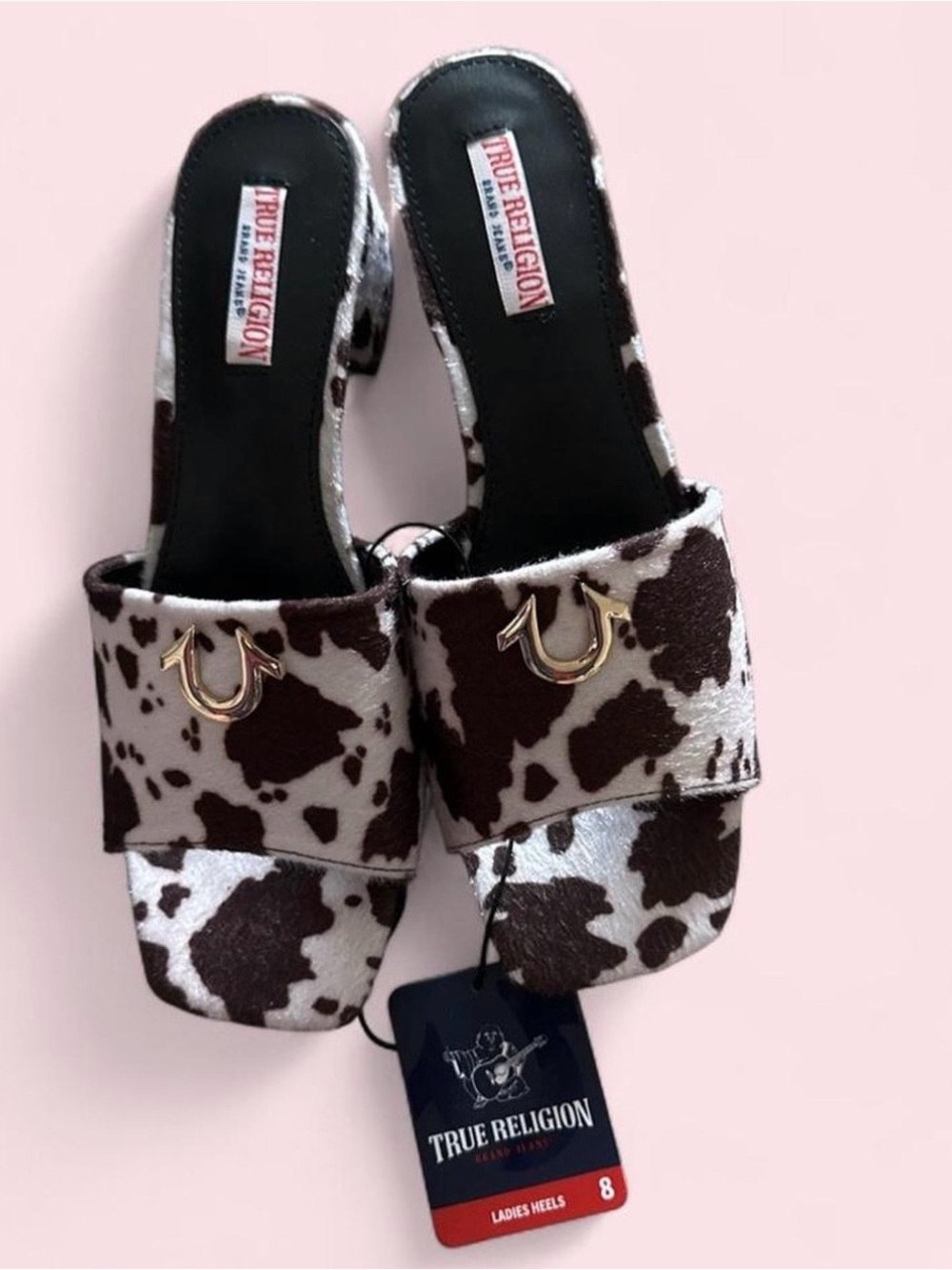 True Religion Brown and White Cowprint Slide Mules with Gold Accent